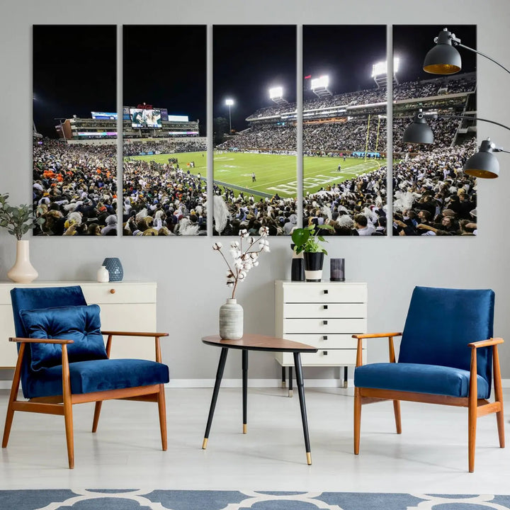 Showcased as premium wall art, this gallery-quality canvas features a print of the Georgia Tech Yellow Jackets Football Team at Atlanta's Bobby Dodd Stadium during a crowded, illuminated night game.