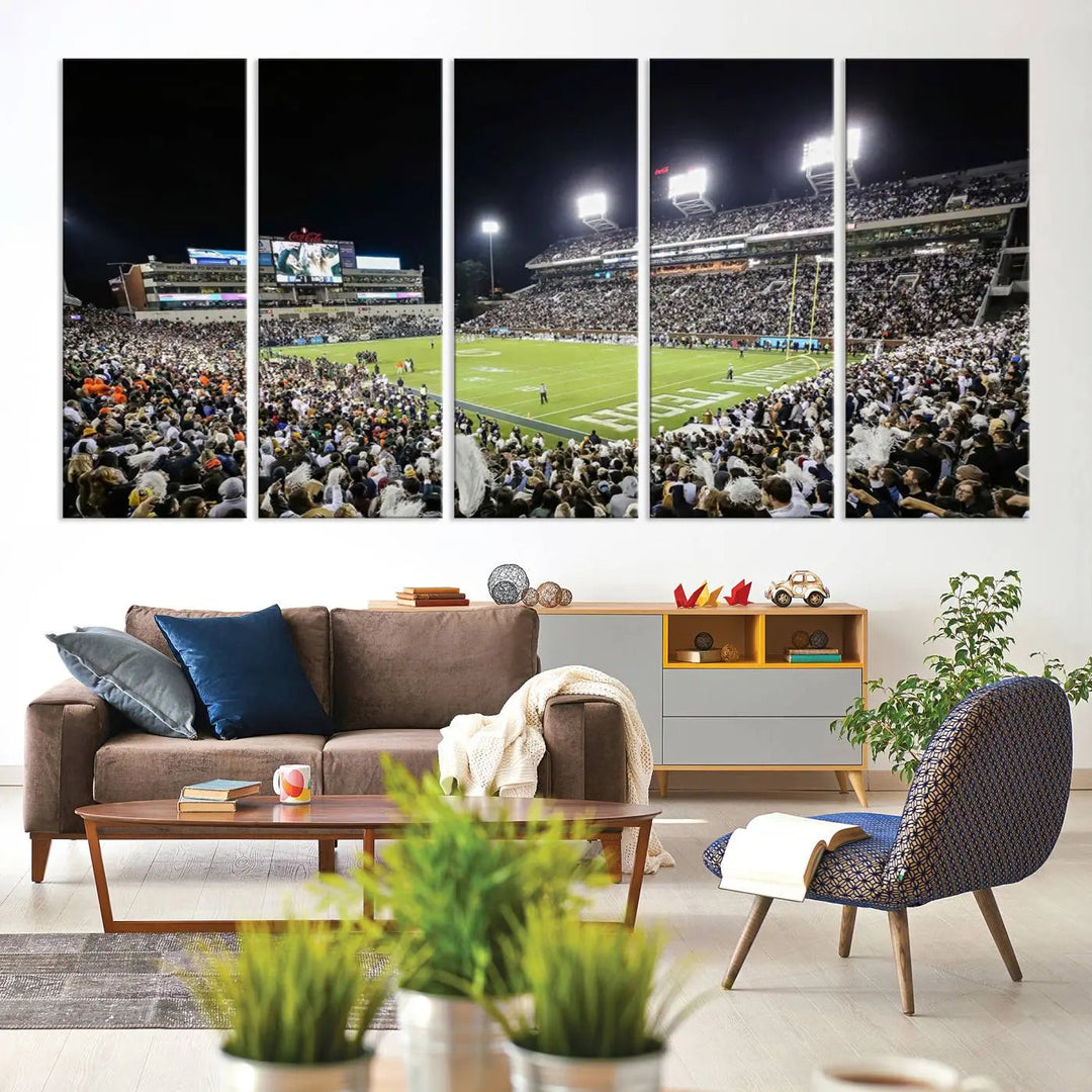 Showcased as premium wall art, this gallery-quality canvas features a print of the Georgia Tech Yellow Jackets Football Team at Atlanta's Bobby Dodd Stadium during a crowded, illuminated night game.