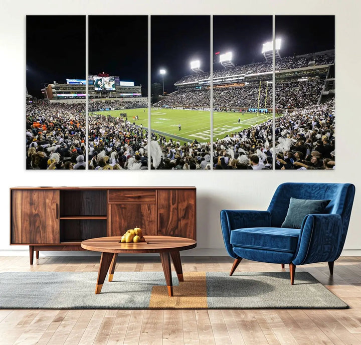 Showcased as premium wall art, this gallery-quality canvas features a print of the Georgia Tech Yellow Jackets Football Team at Atlanta's Bobby Dodd Stadium during a crowded, illuminated night game.