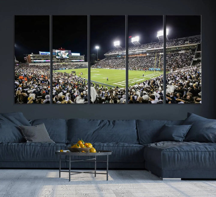 Showcased as premium wall art, this gallery-quality canvas features a print of the Georgia Tech Yellow Jackets Football Team at Atlanta's Bobby Dodd Stadium during a crowded, illuminated night game.