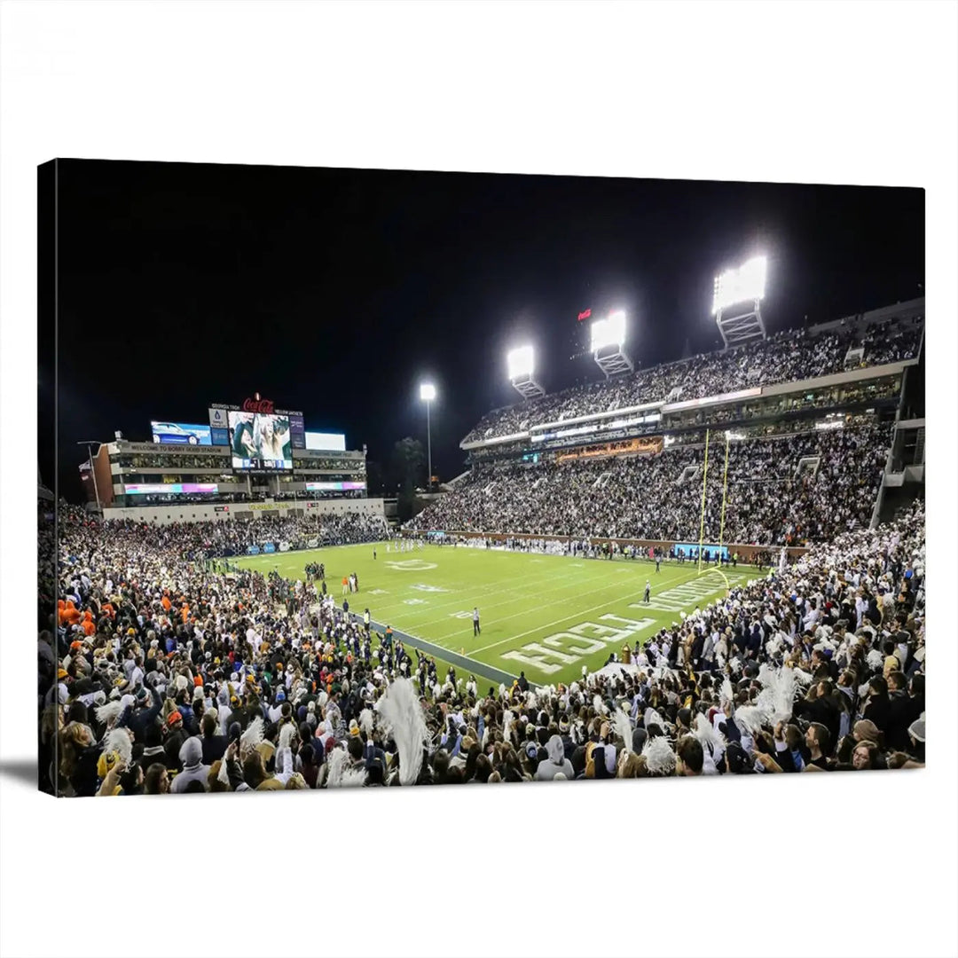 Showcased as premium wall art, this gallery-quality canvas features a print of the Georgia Tech Yellow Jackets Football Team at Atlanta's Bobby Dodd Stadium during a crowded, illuminated night game.