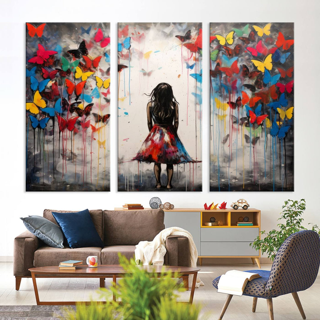 The Girl Butterfly Graffiti Abstract Canvas Print, featuring a vibrant depiction of a girl surrounded by butterflies on museum-quality canvas, is displayed prominently.