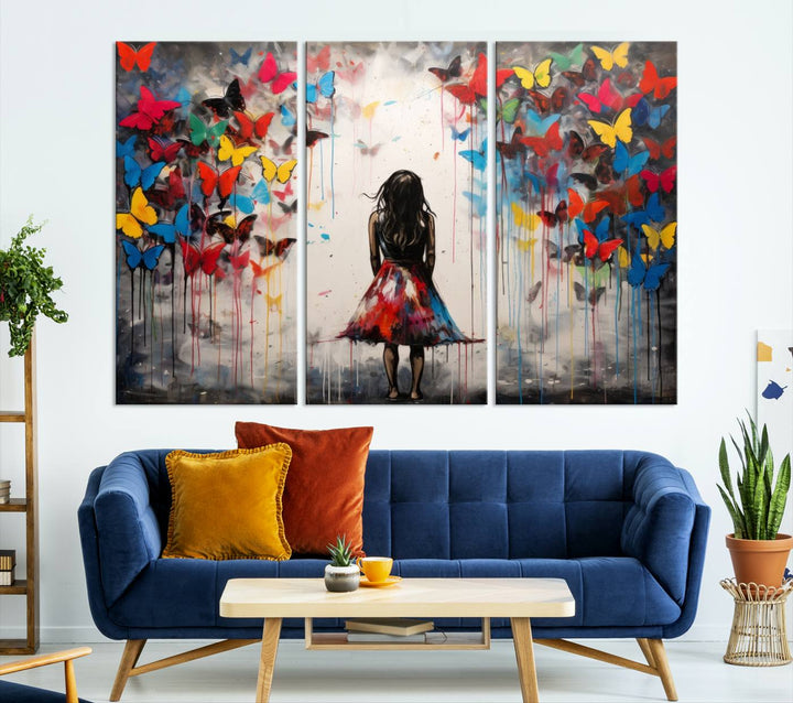 The Girl Butterfly Graffiti Abstract Canvas Print, featuring a vibrant depiction of a girl surrounded by butterflies on museum-quality canvas, is displayed prominently.