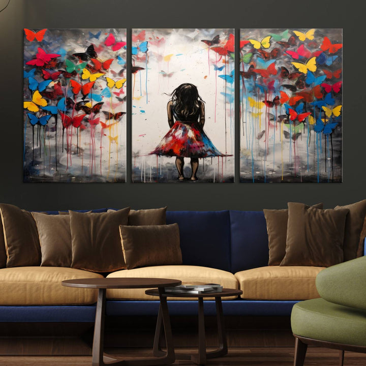 The Girl Butterfly Graffiti Abstract Canvas Print, featuring a vibrant depiction of a girl surrounded by butterflies on museum-quality canvas, is displayed prominently.