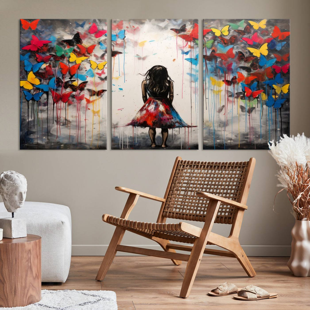 The Girl Butterfly Graffiti Abstract Canvas Print, featuring a vibrant depiction of a girl surrounded by butterflies on museum-quality canvas, is displayed prominently.