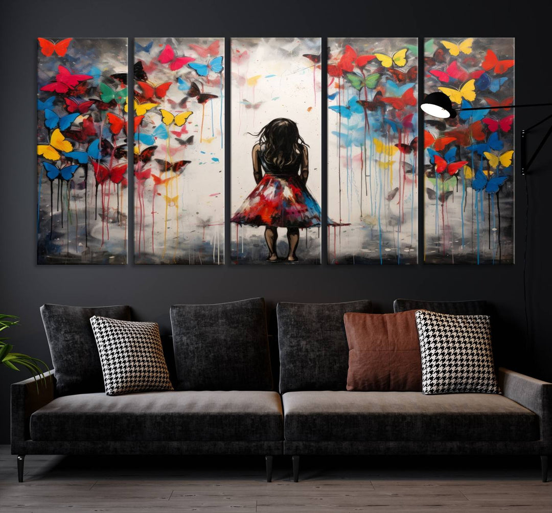 The Girl Butterfly Graffiti Abstract Canvas Print, featuring a vibrant depiction of a girl surrounded by butterflies on museum-quality canvas, is displayed prominently.