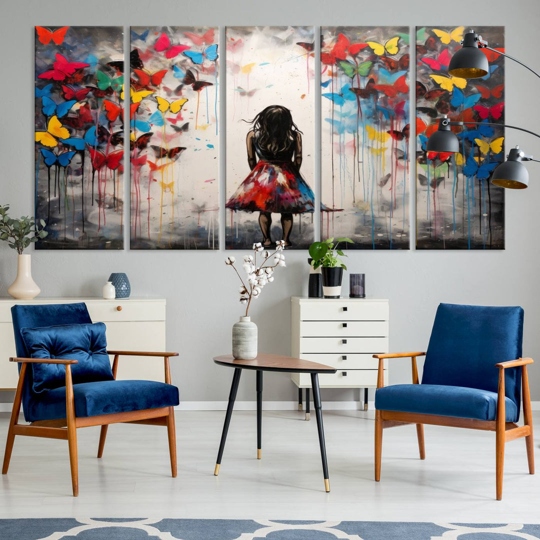 The Girl Butterfly Graffiti Abstract Canvas Print, featuring a vibrant depiction of a girl surrounded by butterflies on museum-quality canvas, is displayed prominently.