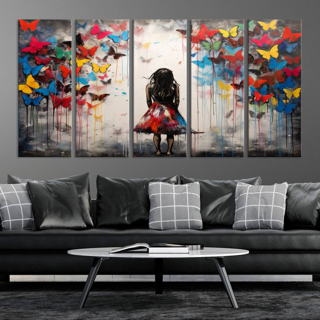 The Girl Butterfly Graffiti Abstract Canvas Print, featuring a vibrant depiction of a girl surrounded by butterflies on museum-quality canvas, is displayed prominently.