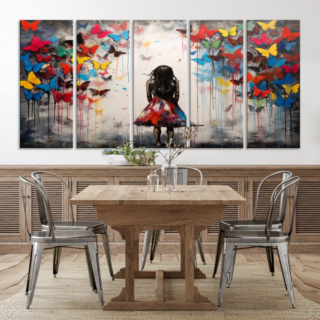 The Girl Butterfly Graffiti Abstract Canvas Print, featuring a vibrant depiction of a girl surrounded by butterflies on museum-quality canvas, is displayed prominently.