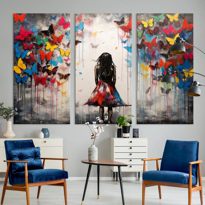 The Girl Butterfly Graffiti Abstract Canvas Print, featuring a vibrant depiction of a girl surrounded by butterflies on museum-quality canvas, is displayed prominently.