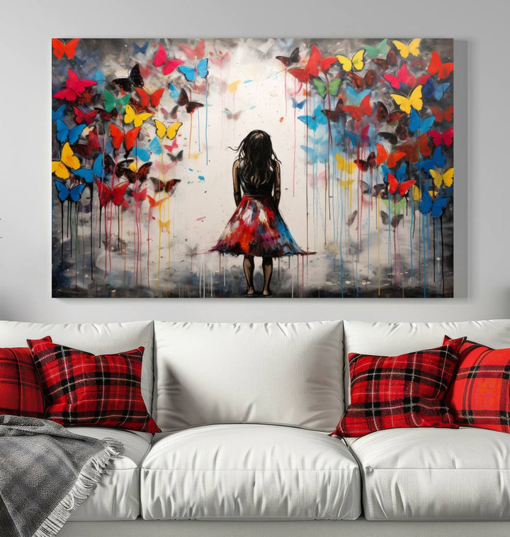 The Girl Butterfly Graffiti Abstract Canvas Print, featuring a vibrant depiction of a girl surrounded by butterflies on museum-quality canvas, is displayed prominently.