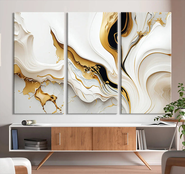 Three Gold Waves on Pure White art pieces adorn a dark wall.