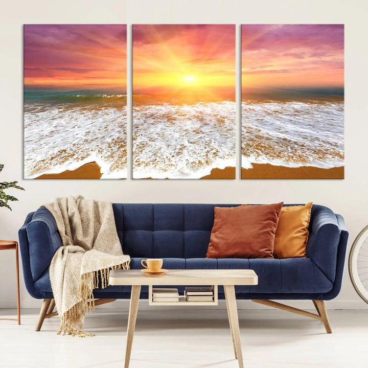 The "Golden Beach Sunrise Canvas Wall Art," a three-panel giclee print featuring ocean waves on a sandy shore, beautifully adorns the gray wall.