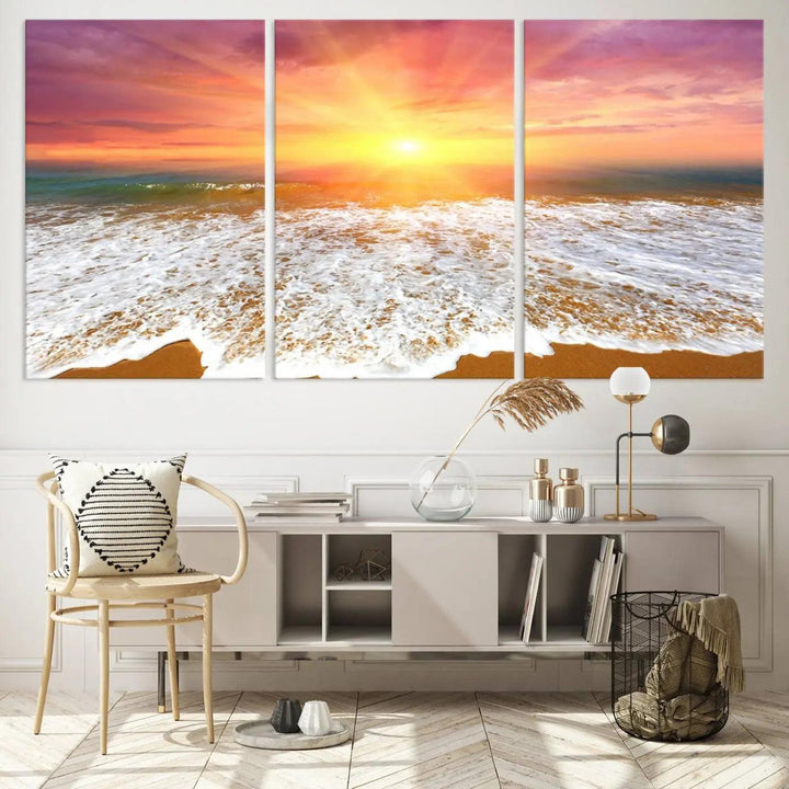 The "Golden Beach Sunrise Canvas Wall Art," a three-panel giclee print featuring ocean waves on a sandy shore, beautifully adorns the gray wall.