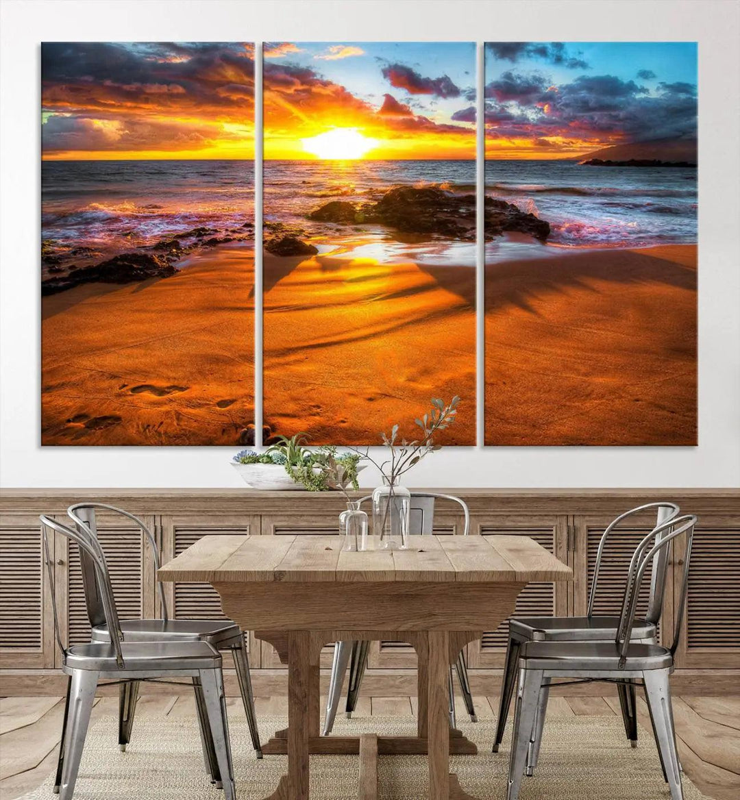 The vibrant panoramic view captured in the Golden Beach Sunset Canvas Art offers a serene scene of nature's tranquil beauty over the rocky shoreline. This Giclee canvas print, featuring a gallery wrap, beautifully depicts a breathtaking seascape for your space.