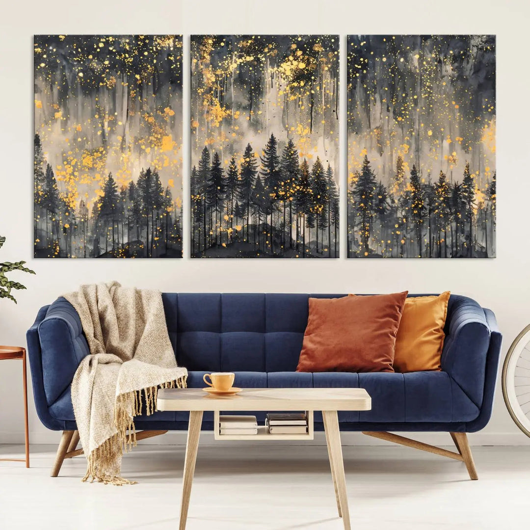 The modern living room features the Golden Forest Abstract Wall Art, a triptych canvas print that displays a mystical dark forest with gold splatter accents, elegantly showcased on the white wall.