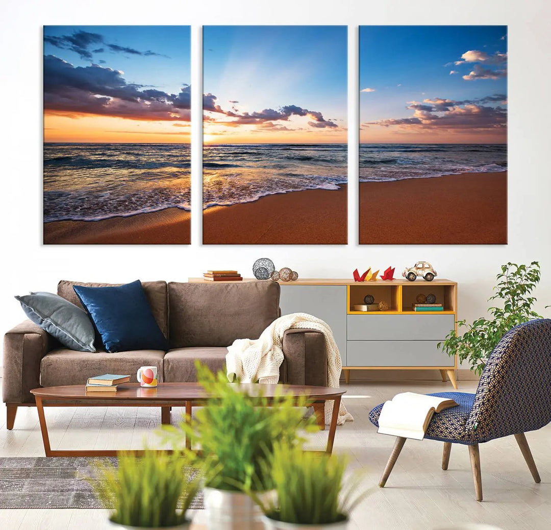 A Golden Hour Beach Sunset wall art canvas print decorates the wall in the bright room.