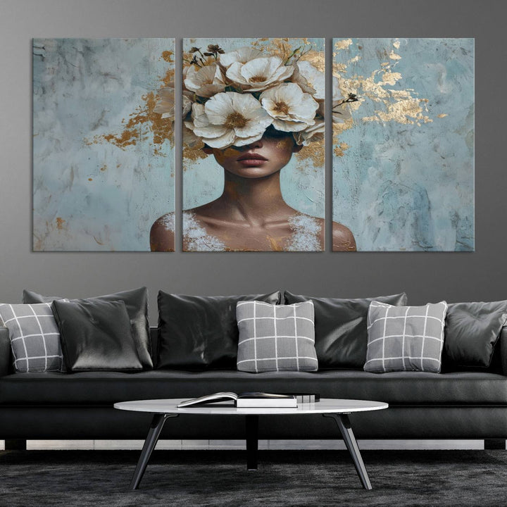 Golden Petal Wall Art: a stunning 3-panel canvas featuring a woman adorned with flowers.