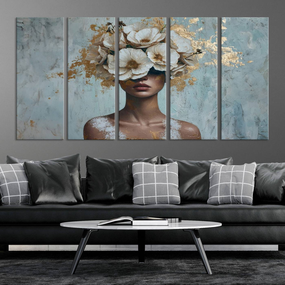 Golden Petal Wall Art: a stunning 3-panel canvas featuring a woman adorned with flowers.