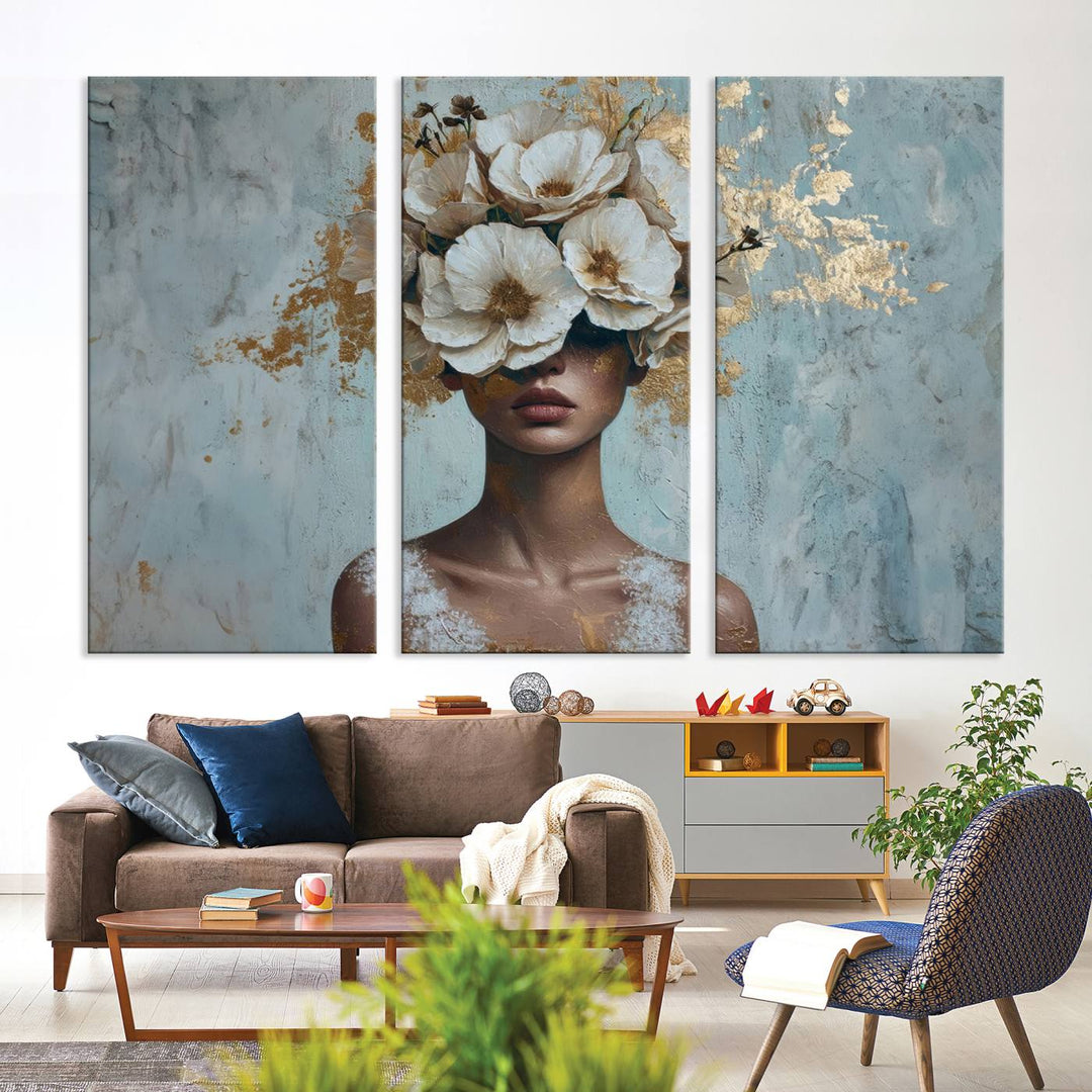 Golden Petal Wall Art: a stunning 3-panel canvas featuring a woman adorned with flowers.