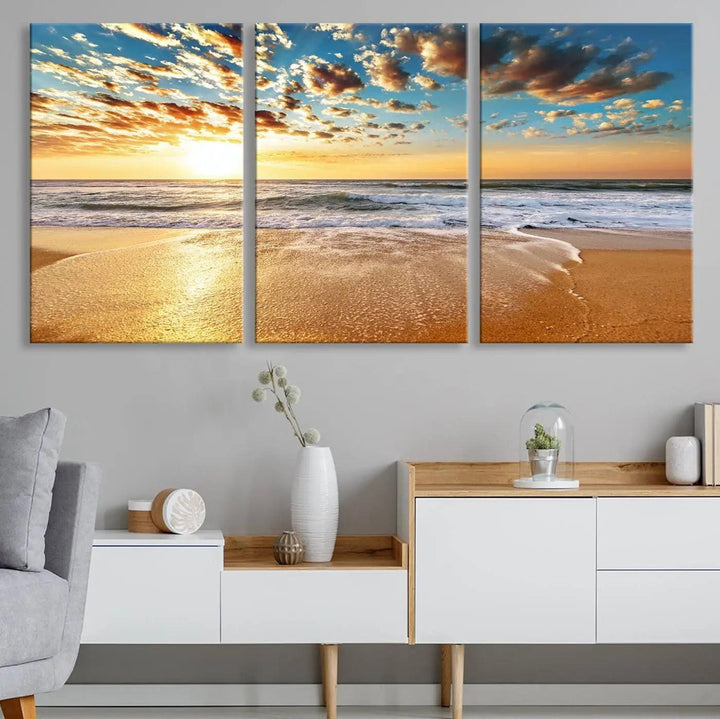 The "Golden Sunset Beach" triptych, a giclee canvas print showcasing Canon print quality, beautifully captures a serene beach sunset with waves lapping at the golden sand.