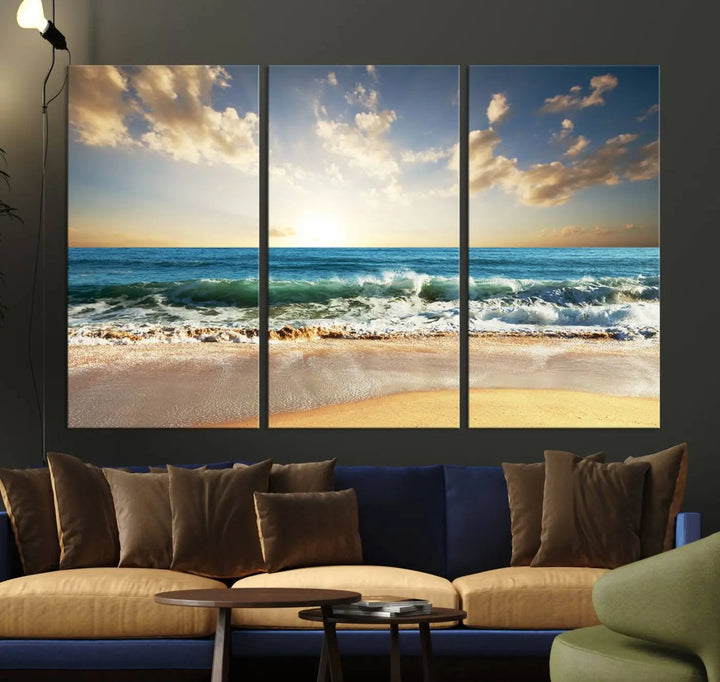 Golden Sunset Beach Triptych Canvas Wall Art on a dark living room wall.