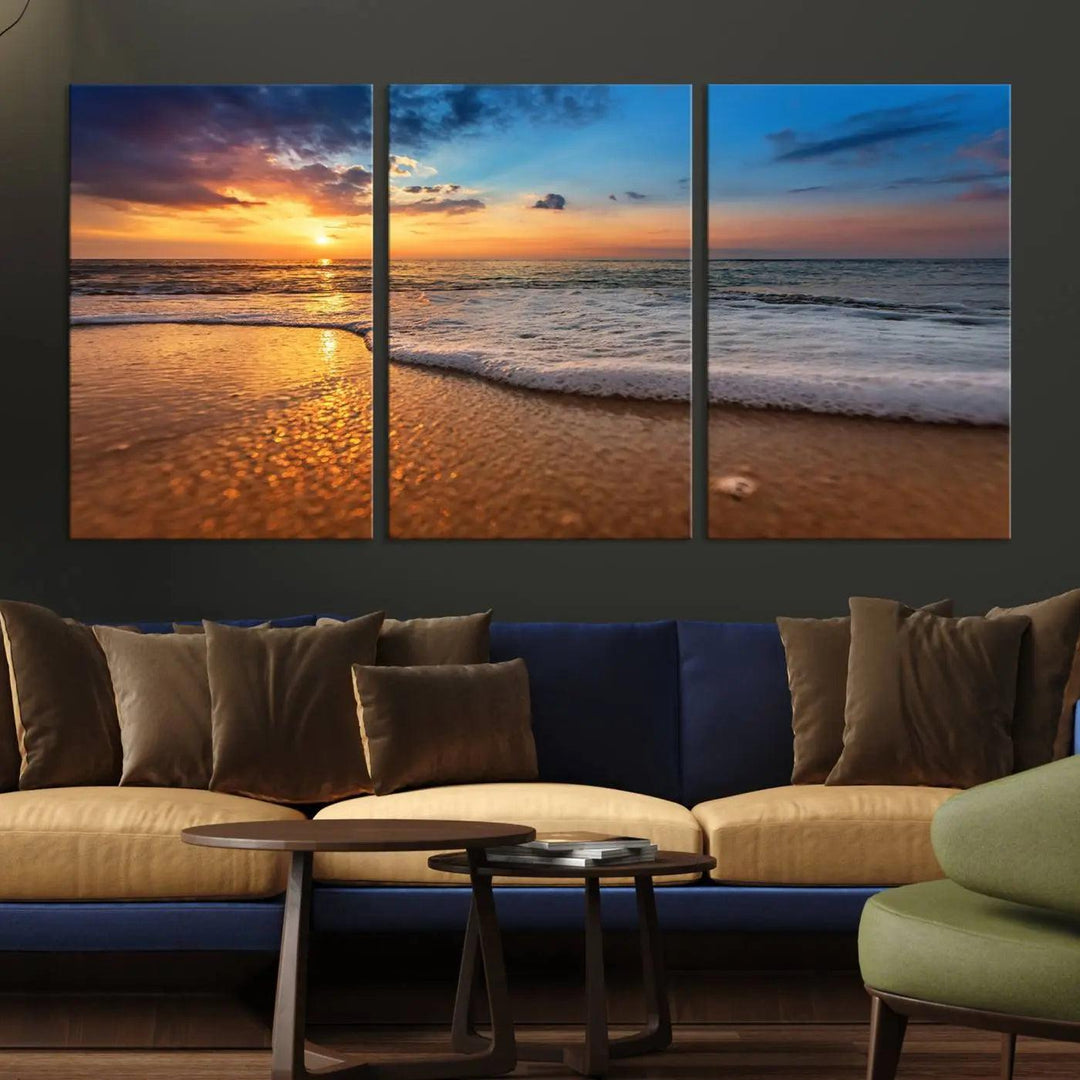 The wall art, titled "Golden Sunset Beach Waves Triptych Canvas," captures a vibrant sunset over the ocean with gentle waves on a sandy beach.