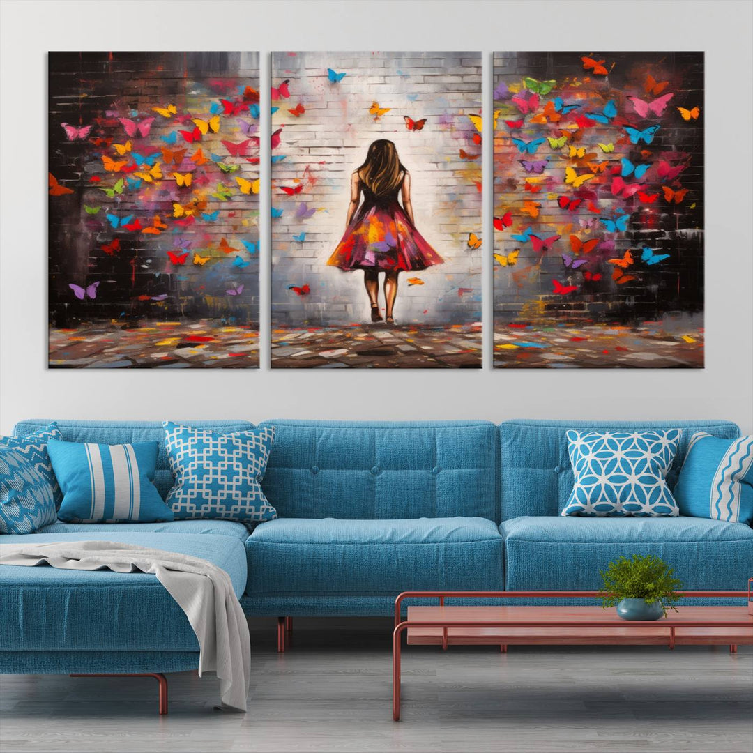 A vibrant artwork titled "Graffiti Wall Art Canvas Print Girl Butterfly Graffiti Abstract Canvas Print" is displayed above the couch. This gallery-wrapped masterpiece, printed on museum-quality canvas, features a UV-protective coating to preserve its vivid beauty.