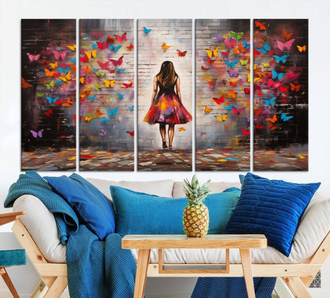 A vibrant artwork titled "Graffiti Wall Art Canvas Print Girl Butterfly Graffiti Abstract Canvas Print" is displayed above the couch. This gallery-wrapped masterpiece, printed on museum-quality canvas, features a UV-protective coating to preserve its vivid beauty.