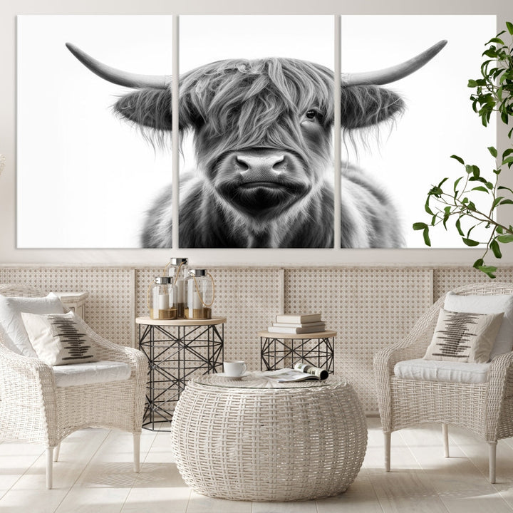 A three-panel wall art from the Highland Cow Animal Canvas series showcases a long-haired, large-horned cow. This Texas Cattle Art Print is crafted on museum-quality canvas with a UV-protective coating, making it an ideal addition to transform your living room.