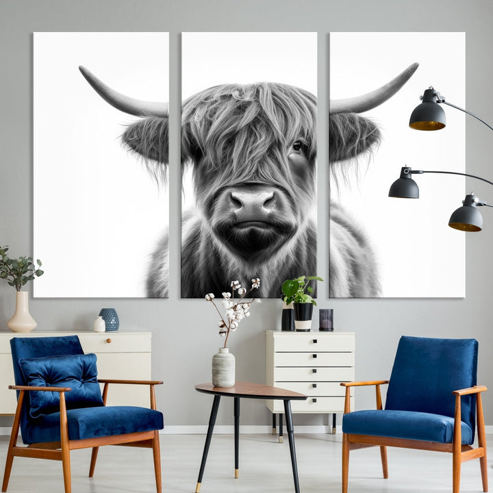 A three-panel wall art from the Highland Cow Animal Canvas series showcases a long-haired, large-horned cow. This Texas Cattle Art Print is crafted on museum-quality canvas with a UV-protective coating, making it an ideal addition to transform your living room.