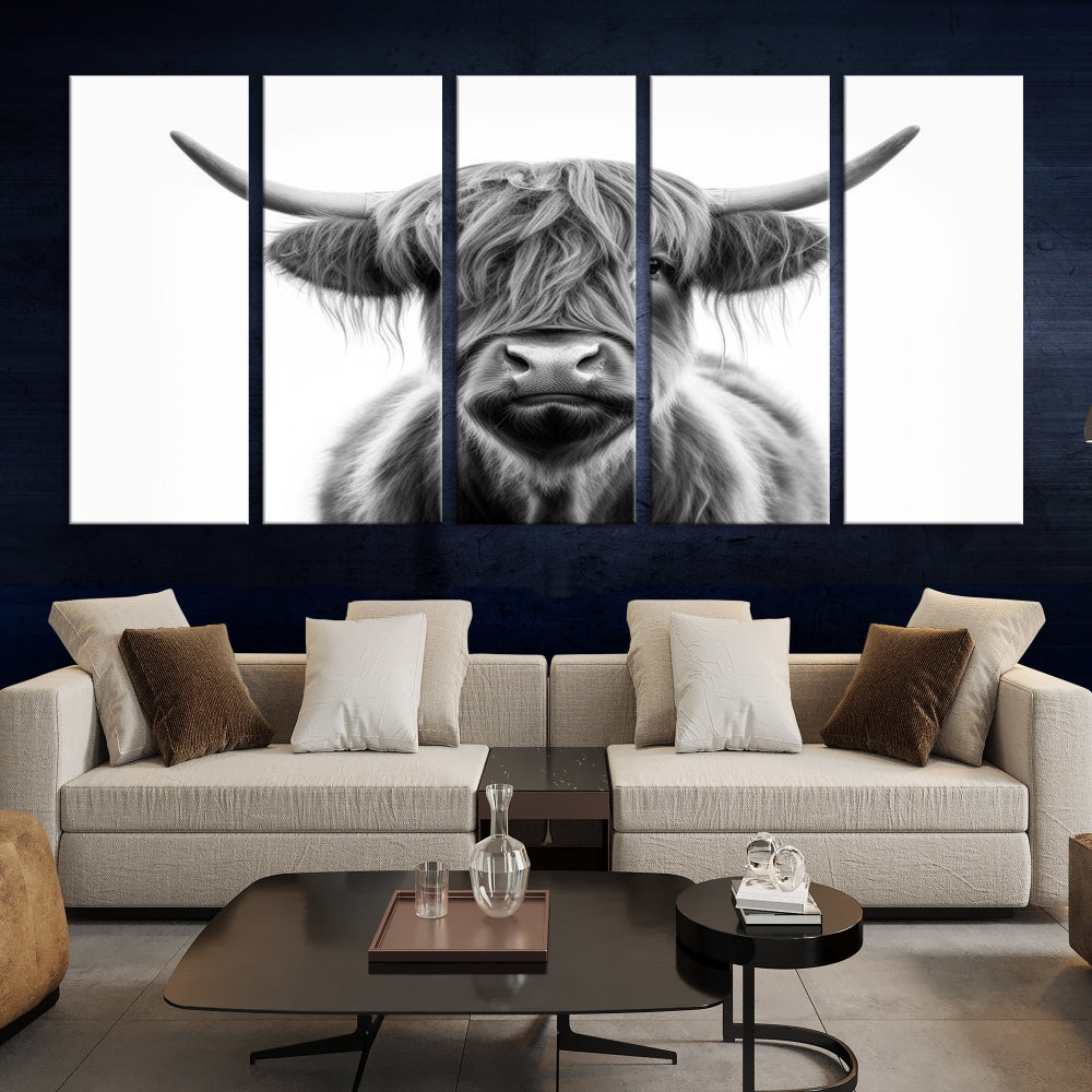 A three-panel wall art from the Highland Cow Animal Canvas series showcases a long-haired, large-horned cow. This Texas Cattle Art Print is crafted on museum-quality canvas with a UV-protective coating, making it an ideal addition to transform your living room.