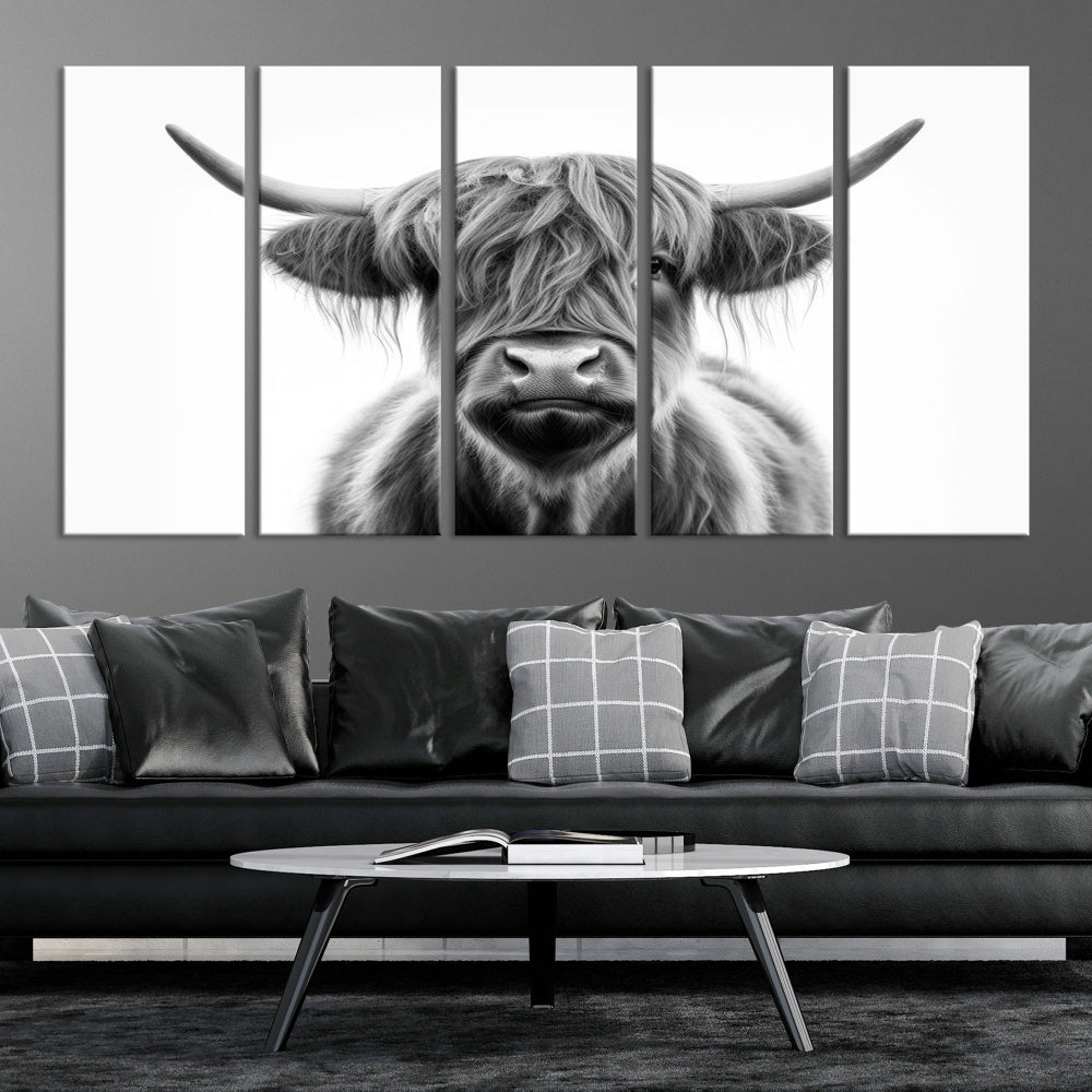 A three-panel wall art from the Highland Cow Animal Canvas series showcases a long-haired, large-horned cow. This Texas Cattle Art Print is crafted on museum-quality canvas with a UV-protective coating, making it an ideal addition to transform your living room.