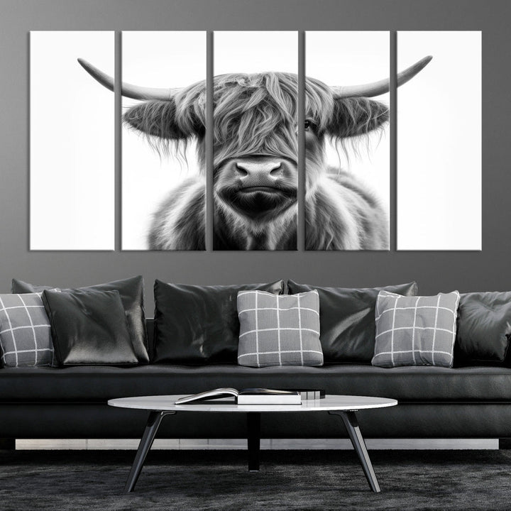 A three-panel wall art from the Highland Cow Animal Canvas series showcases a long-haired, large-horned cow. This Texas Cattle Art Print is crafted on museum-quality canvas with a UV-protective coating, making it an ideal addition to transform your living room.