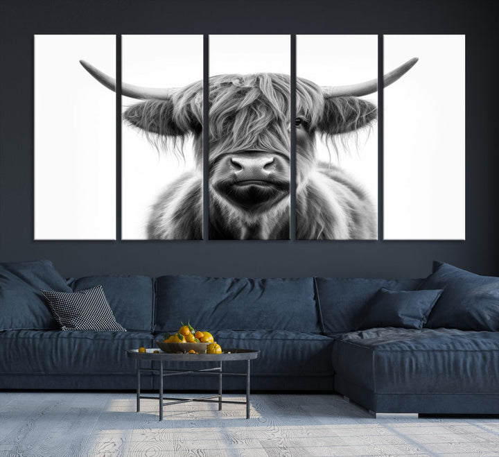 A three-panel wall art from the Highland Cow Animal Canvas series showcases a long-haired, large-horned cow. This Texas Cattle Art Print is crafted on museum-quality canvas with a UV-protective coating, making it an ideal addition to transform your living room.