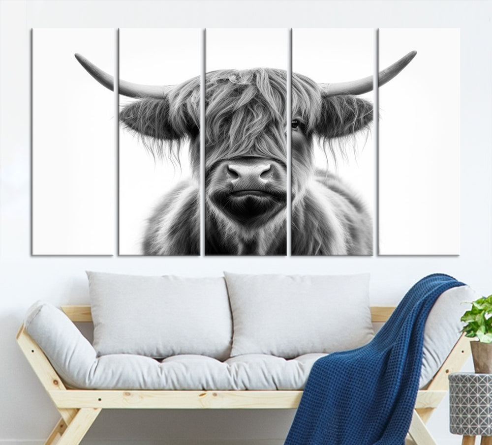 A three-panel wall art from the Highland Cow Animal Canvas series showcases a long-haired, large-horned cow. This Texas Cattle Art Print is crafted on museum-quality canvas with a UV-protective coating, making it an ideal addition to transform your living room.