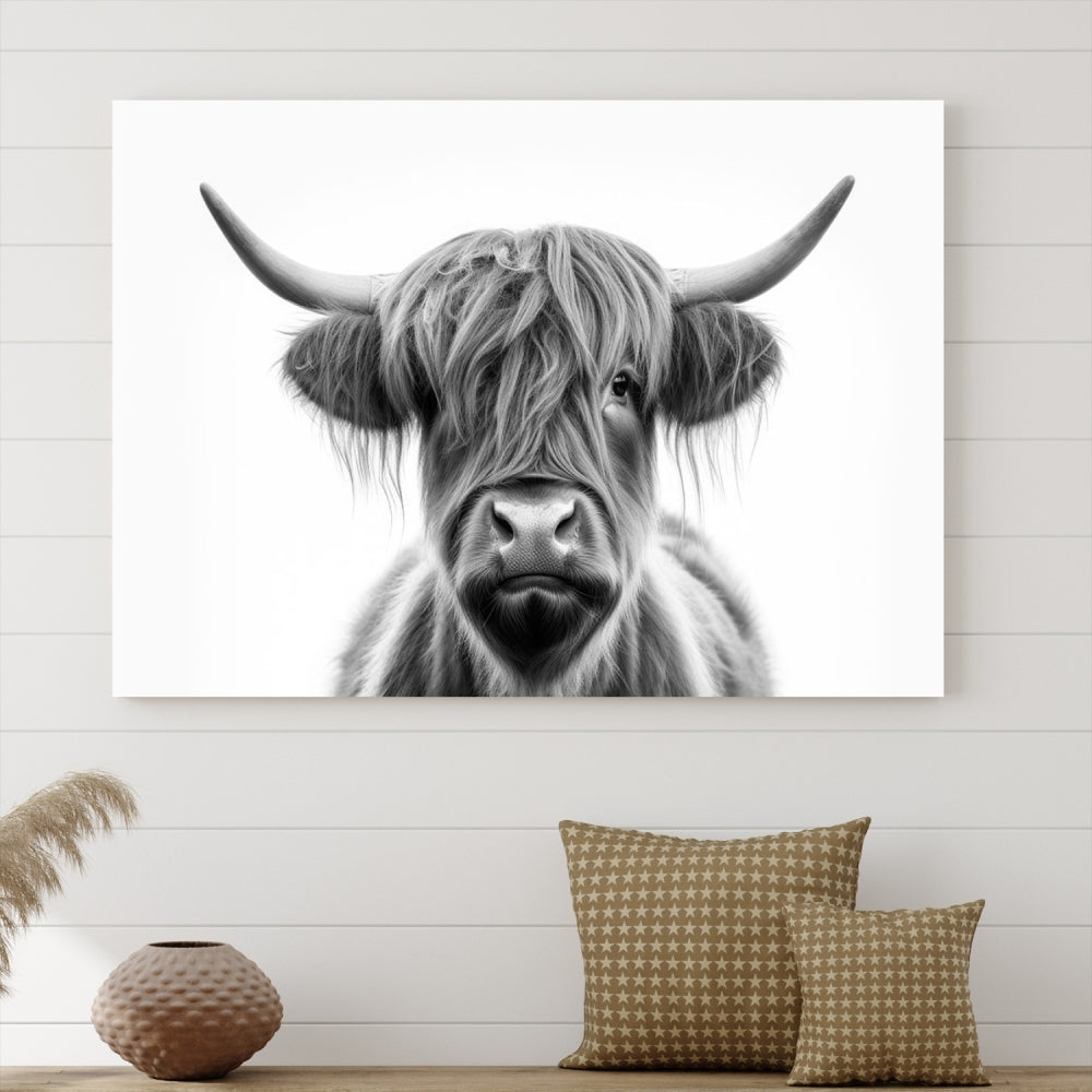 A three-panel wall art from the Highland Cow Animal Canvas series showcases a long-haired, large-horned cow. This Texas Cattle Art Print is crafted on museum-quality canvas with a UV-protective coating, making it an ideal addition to transform your living room.