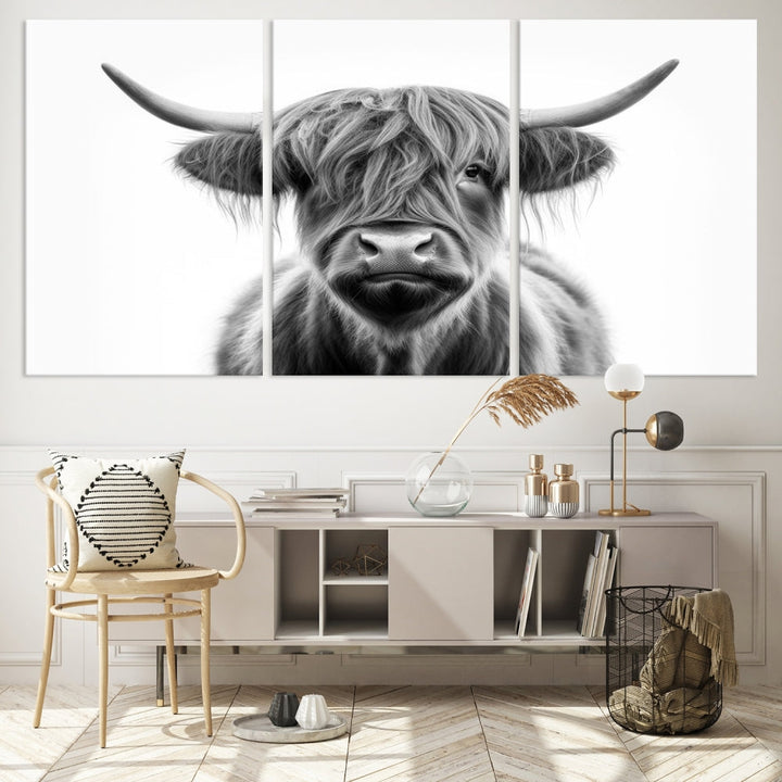 A three-panel wall art from the Highland Cow Animal Canvas series showcases a long-haired, large-horned cow. This Texas Cattle Art Print is crafted on museum-quality canvas with a UV-protective coating, making it an ideal addition to transform your living room.