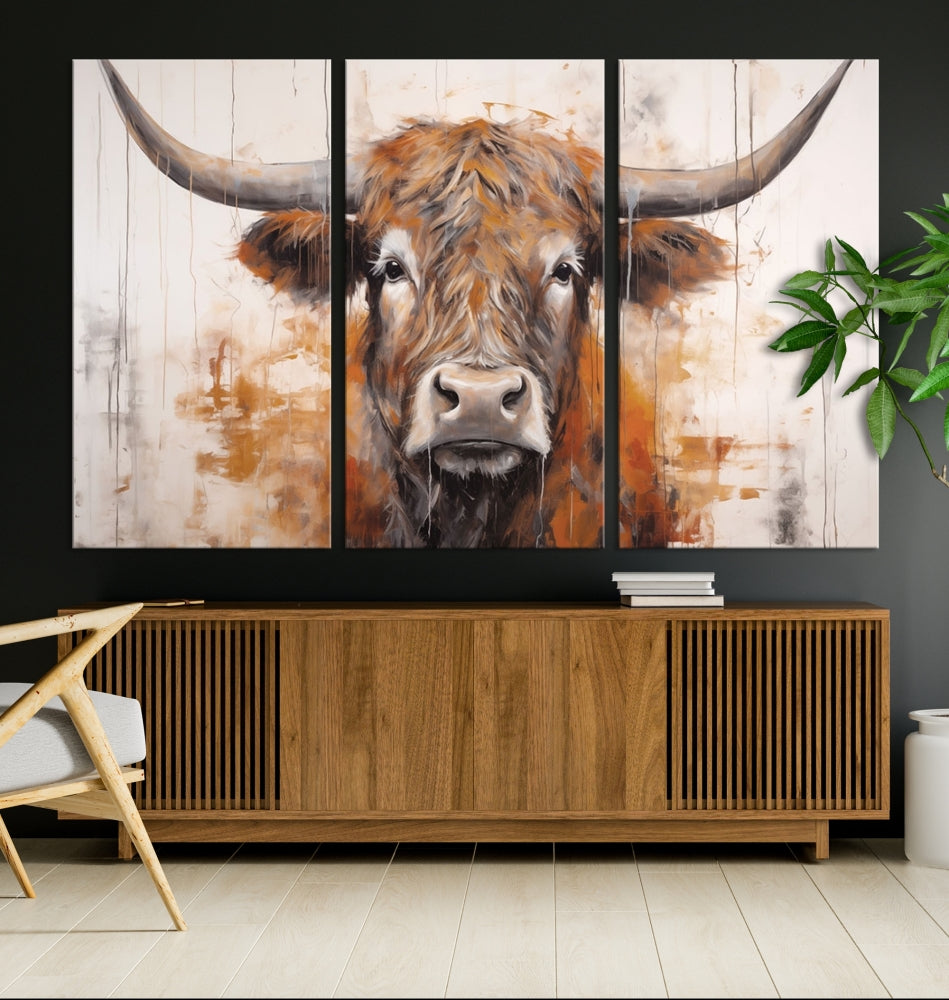 Hanging above is the impressive Highland Cow Canvas Wall Art Print, a piece of farmhouse-inspired decor in a bold artistic style.