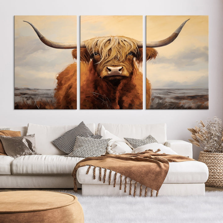 The Highland Cow Wall Art Canvas Print - Rustic Modern Decor, features a framed large panel showcasing a shaggy-haired cow with long horns, adding rustic charm to any space. Available in 3 or 5 pieces and ready to hang, it's perfect for the living room, office, or dining room.