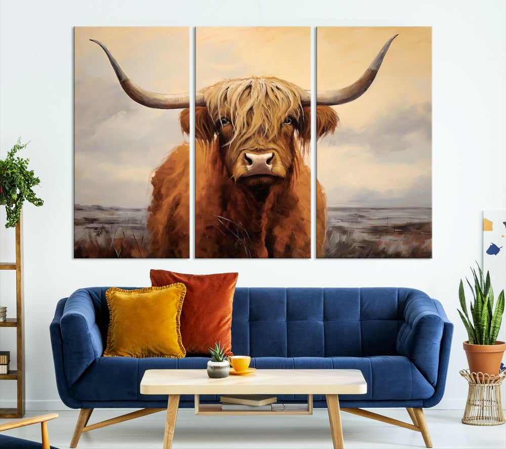 The Highland Cow Wall Art Canvas Print - Rustic Modern Decor, features a framed large panel showcasing a shaggy-haired cow with long horns, adding rustic charm to any space. Available in 3 or 5 pieces and ready to hang, it's perfect for the living room, office, or dining room.