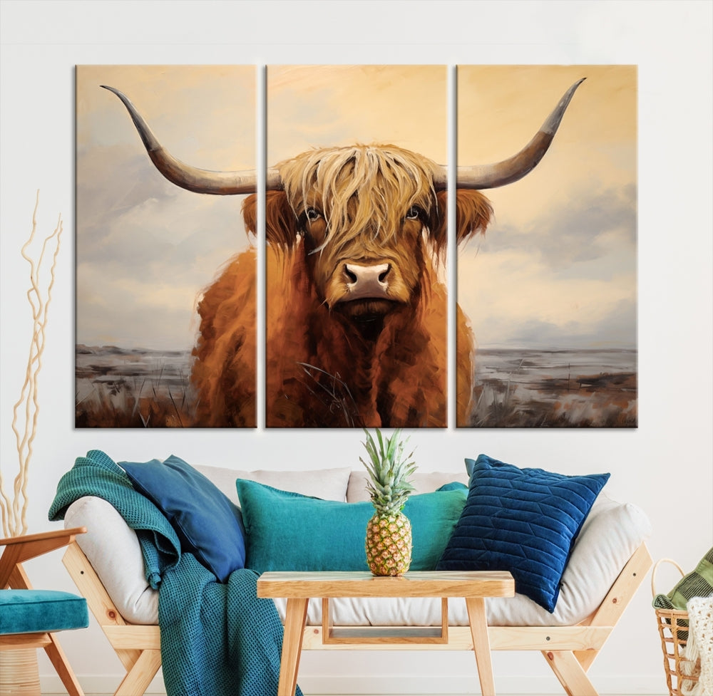 The Highland Cow Wall Art Canvas Print - Rustic Modern Decor, features a framed large panel showcasing a shaggy-haired cow with long horns, adding rustic charm to any space. Available in 3 or 5 pieces and ready to hang, it's perfect for the living room, office, or dining room.