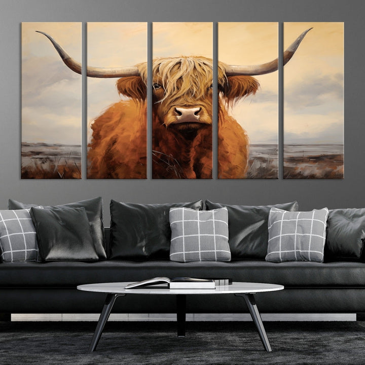 The Highland Cow Wall Art Canvas Print - Rustic Modern Decor, features a framed large panel showcasing a shaggy-haired cow with long horns, adding rustic charm to any space. Available in 3 or 5 pieces and ready to hang, it's perfect for the living room, office, or dining room.