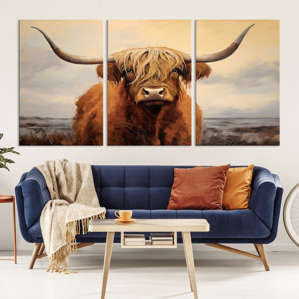 The Highland Cow Wall Art Canvas Print - Rustic Modern Decor, features a framed large panel showcasing a shaggy-haired cow with long horns, adding rustic charm to any space. Available in 3 or 5 pieces and ready to hang, it's perfect for the living room, office, or dining room.