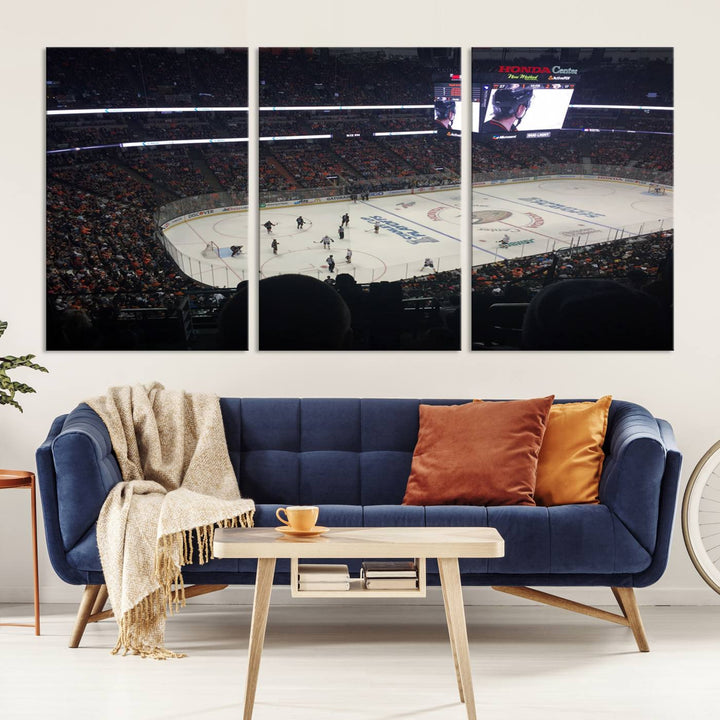 The Honda Center California Anaheim Ducks Hockey Stadium Wall Art Canvas Print is a triptych that captures a hockey game with crowded stands, making it a stunning piece of wall art with a gallery-quality finish.