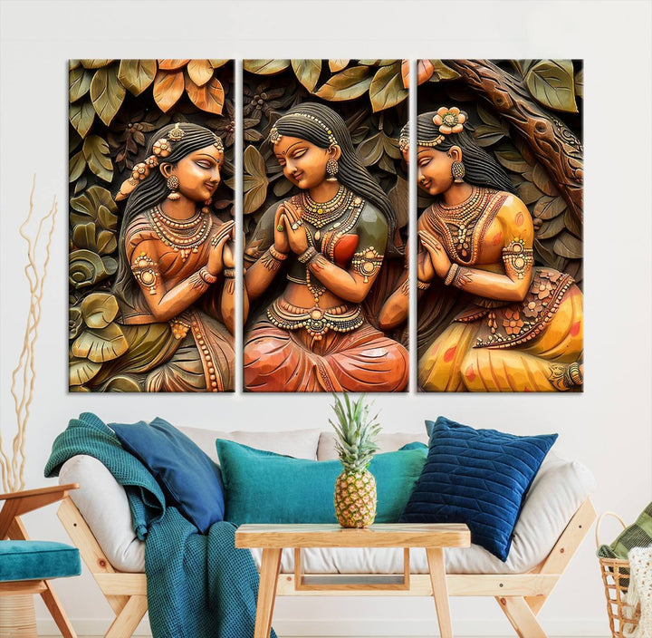 Hanging in the room are three museum-quality canvas prints titled "Indian Woman Statue Wall Art," each depicting women in traditional attire.