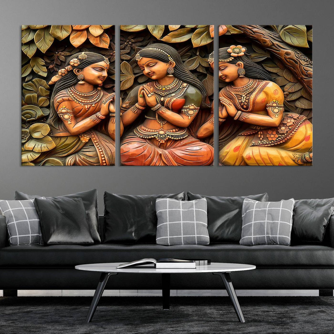 Hanging in the room are three museum-quality canvas prints titled "Indian Woman Statue Wall Art," each depicting women in traditional attire.