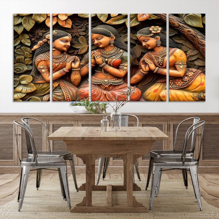 Hanging in the room are three museum-quality canvas prints titled "Indian Woman Statue Wall Art," each depicting women in traditional attire.