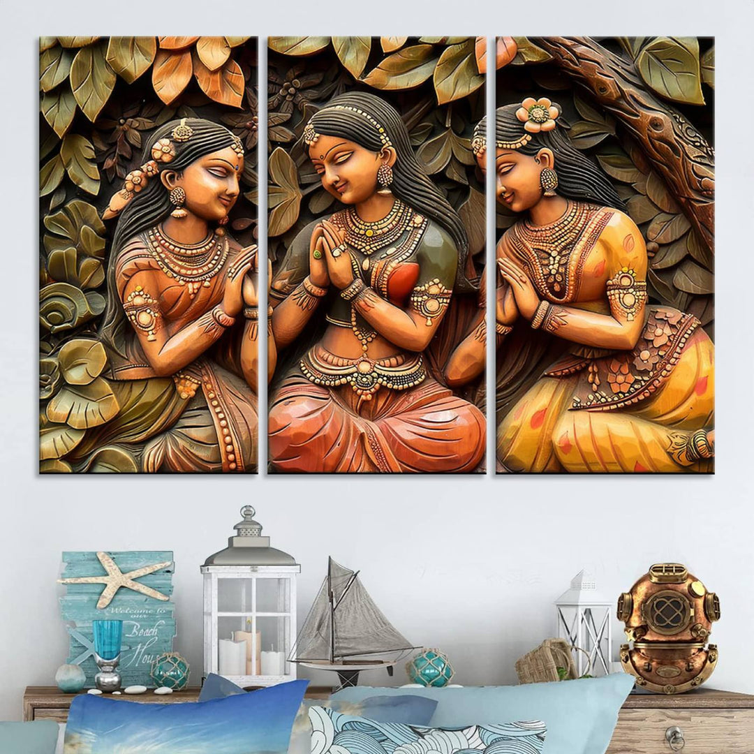 Hanging in the room are three museum-quality canvas prints titled "Indian Woman Statue Wall Art," each depicting women in traditional attire.