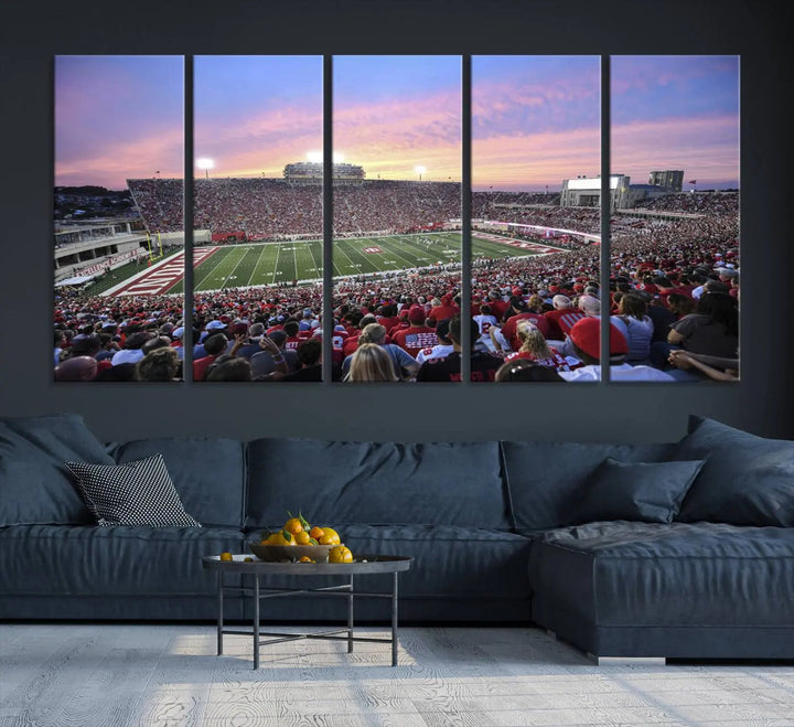 Living room featuring the Indiana University Hoosiers Football Team Print - Bloomington Memorial Stadium Wall Art Canvas Print, showcasing a packed football stadium at sunset for a gallery-quality finish.